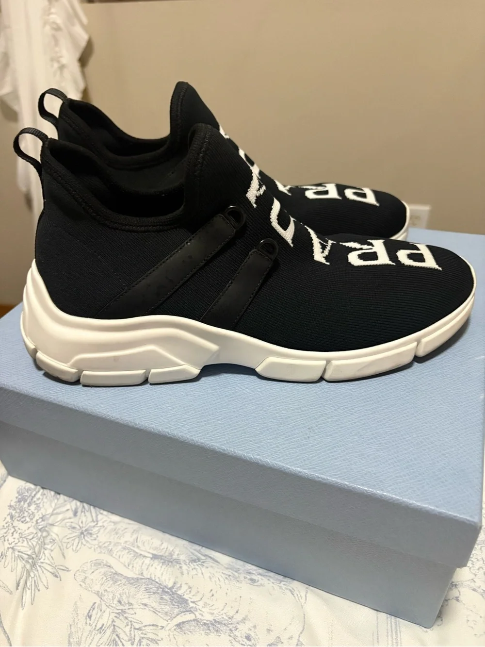 Prada womens Black Logo Knit Slip-On Sneakers
